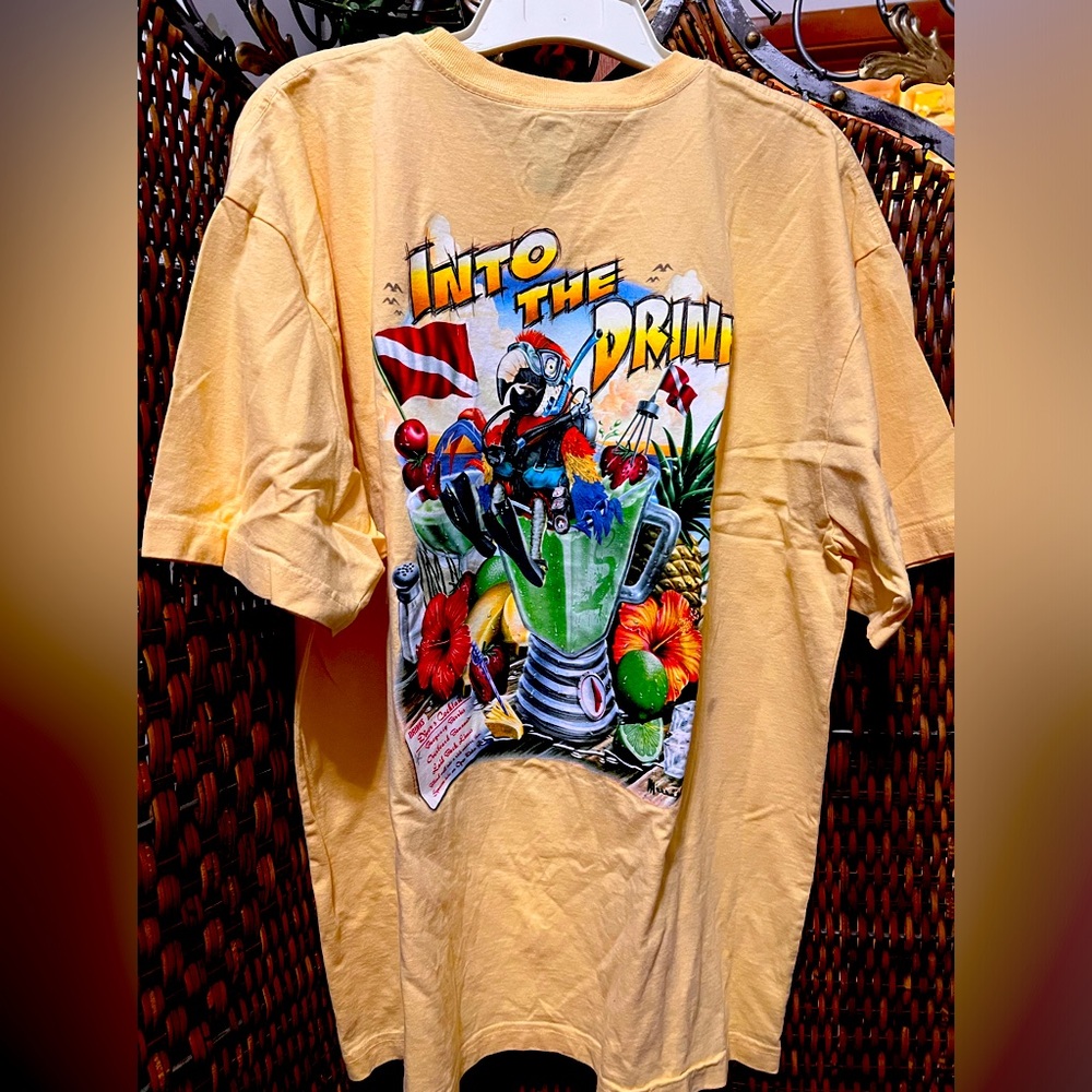 Yellow man’s shirt.